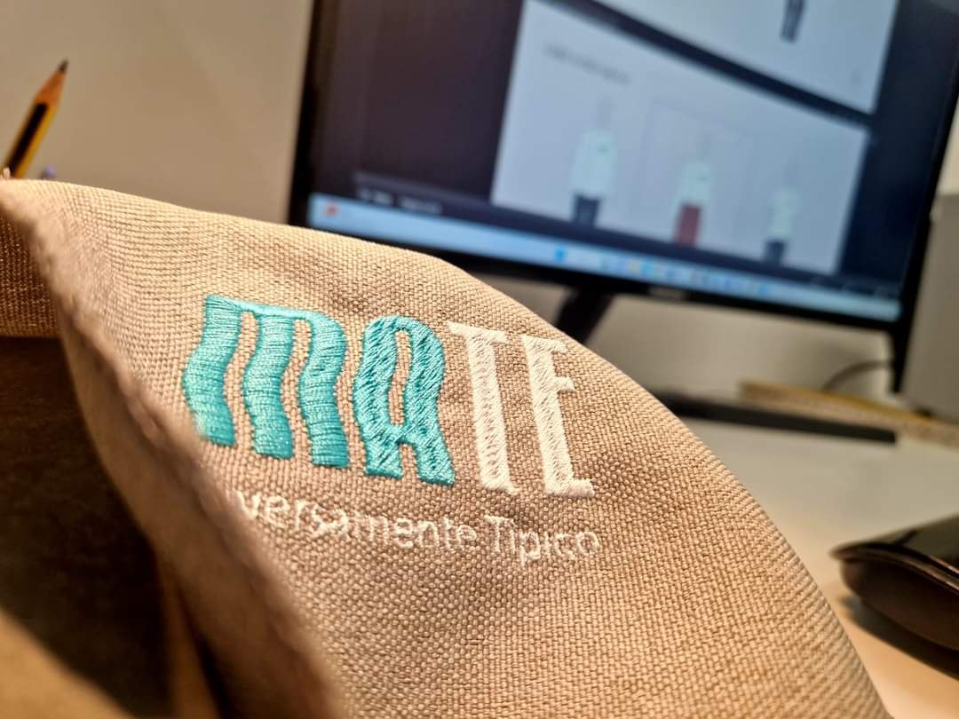 The logo embroidered on the hemp apron